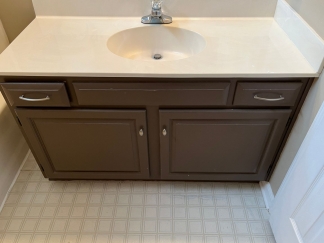 Great house with a corner fireplace that can be viewed from the kitchen and the family room.