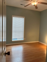 Great house with a corner fireplace that can be viewed from the kitchen and the family room.