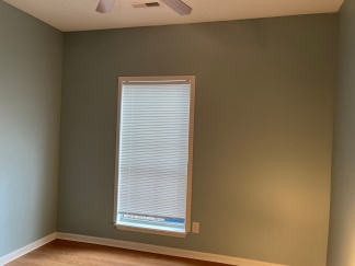 Great house with a corner fireplace that can be viewed from the kitchen and the family room.