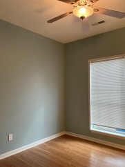 Great house with a corner fireplace that can be viewed from the kitchen and the family room.