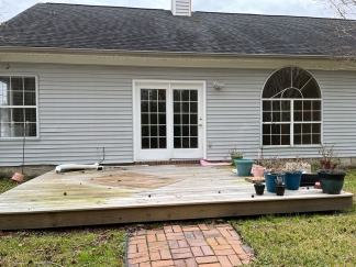 Great house with a corner fireplace that can be viewed from the kitchen and the family room.