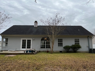 Great house with a corner fireplace that can be viewed from the kitchen and the family room.