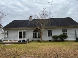 Great house with a corner fireplace that can be viewed from the kitchen and the family room.