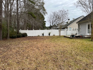 Great house with a corner fireplace that can be viewed from the kitchen and the family room.