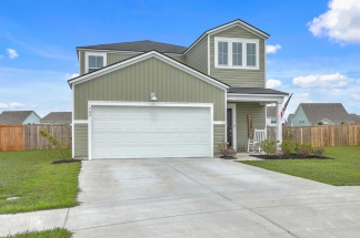 Like-New Pond Lot Home with First-Floor Primary Suite