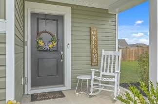Like-New Pond Lot Home with First-Floor Primary Suite