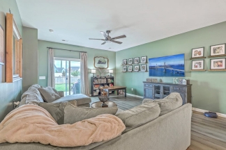 Like-New Pond Lot Home with First-Floor Primary Suite