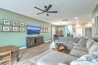 Like-New Pond Lot Home with First-Floor Primary Suite