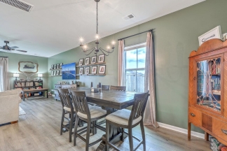 Like-New Pond Lot Home with First-Floor Primary Suite