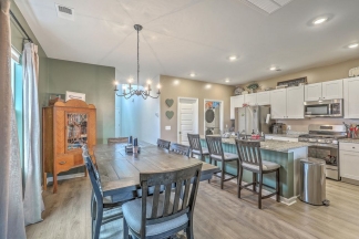 Like-New Pond Lot Home with First-Floor Primary Suite