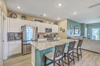 Like-New Pond Lot Home with First-Floor Primary Suite