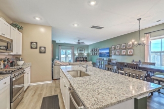 Like-New Pond Lot Home with First-Floor Primary Suite