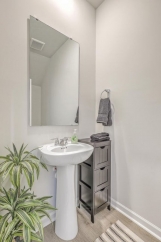 Like-New Pond Lot Home with First-Floor Primary Suite