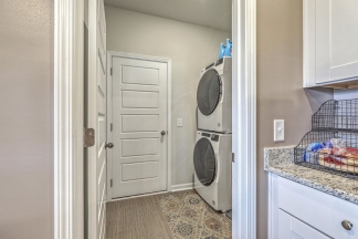 Like-New Pond Lot Home with First-Floor Primary Suite