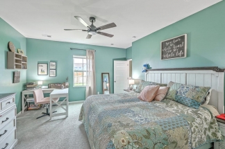 Like-New Pond Lot Home with First-Floor Primary Suite