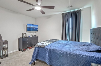 Like-New Pond Lot Home with First-Floor Primary Suite