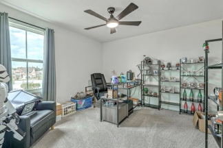 Like-New Pond Lot Home with First-Floor Primary Suite