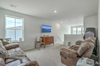 Like-New Pond Lot Home with First-Floor Primary Suite