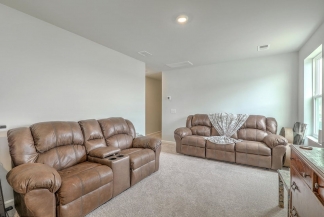 Like-New Pond Lot Home with First-Floor Primary Suite