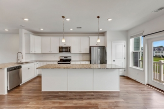 Recess Pointe’s One and Only Duplex! 3 Stories of Comfort & Convenience