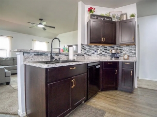 Coming soon! Welcome home to comfort and peace of mind in Harrah!