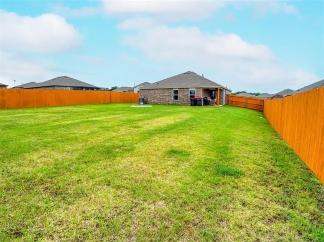 Coming soon! Welcome home to comfort and peace of mind in Harrah!