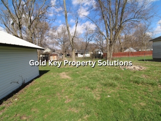 MUNCIE 3 BR 1 BA House with Garage and Covered Porch (SECTION 8 APPROVED)