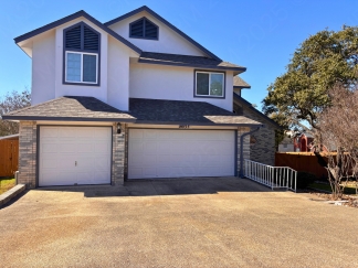 Spacious 4 Bedroom Stone Oak Home with Three Car Garage