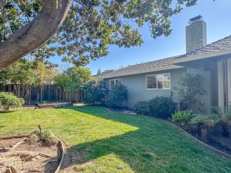 Elegant Saratoga Residence with Chefs Kitchen, Primary Suite & Garden Yard