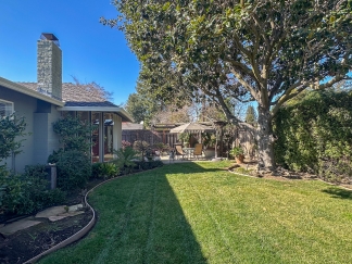 Elegant Saratoga Residence with Chefs Kitchen, Primary Suite & Garden Yard