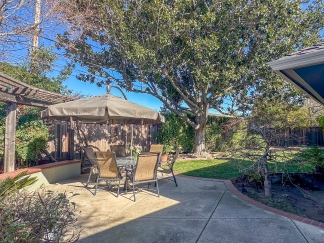 Elegant Saratoga Residence with Chefs Kitchen, Primary Suite & Garden Yard