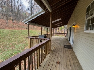 Move In Special 1/2 Off First Full Month with move in by 4/5/2026 - Pet Friendly 4-Bedroom Retreat with Breezeway & Detached Garage & Covered Porches on High Knob Road!