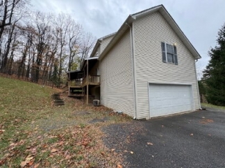Move In Special 1/2 Off First Full Month with move in by 4/5/2026 - Pet Friendly 4-Bedroom Retreat with Breezeway & Detached Garage & Covered Porches on High Knob Road!