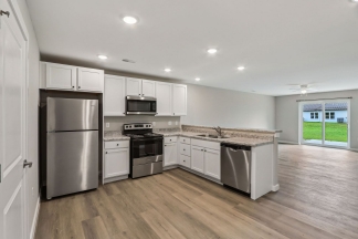 NOW RENTING! Modern 2-Bed, 1-Bath Apartment in Yorktown – Brand New Build With Attached Garage and Private Driveway!