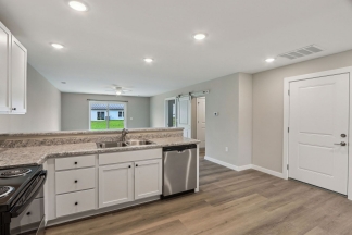 NOW RENTING! Modern 2-Bed, 1-Bath Apartment in Yorktown – Brand New Build With Attached Garage and Private Driveway!