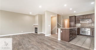 Spacious 3-Bed, 3-Bath Stanton Condo with Elegant Hardwood & Cozy Fireplace at 11352 Renaissance Way