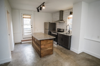 August Only: Submit your application this month and pay a reduced application fee of just $32.Charming Newly Renovated Ground Level Apartment in the Heart of Downtown Winchester