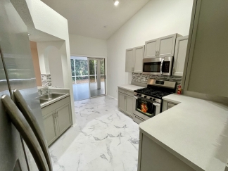 Resort-Style Living Gorgeous two bedroom, two bath, +den, detached villa for rent in North Sarasota