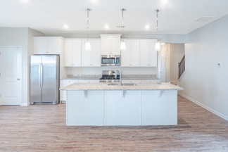 Modern 3BR Home with Spacious Loft, Covered Patio & Private Wooded Backyard