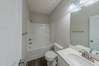 Modern 3BR Home with Spacious Loft, Covered Patio & Private Wooded Backyard