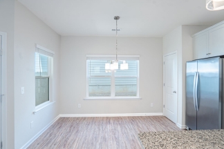 Modern 3BR Home with Spacious Loft, Covered Patio & Private Wooded Backyard