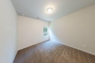 Modern 3BR Home with Spacious Loft, Covered Patio & Private Wooded Backyard