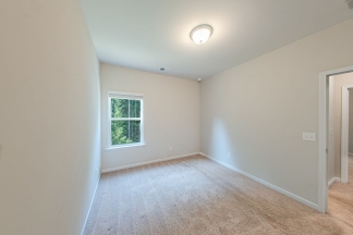 Modern 3BR Home with Spacious Loft, Covered Patio & Private Wooded Backyard
