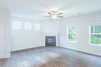Modern 3BR Home with Spacious Loft, Covered Patio & Private Wooded Backyard