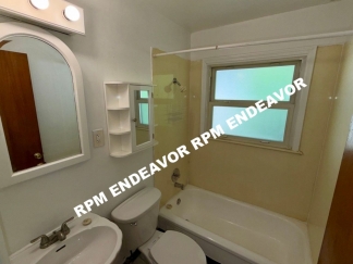 3-Bedroom Home with Hardwood Floors, Basement & Garage!