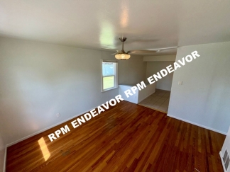 3-Bedroom Home with Hardwood Floors, Basement & Garage!
