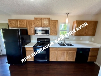 Spacious 3-Bed Wentzville Townhome, 2-Car Garage + Walk-Out Basement!