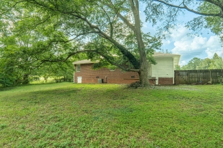 Charming 3BR Brick Ranch in Smyrna | Hardwood Floors, Fenced Backyard & Convenient Location