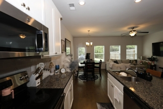 Unfurnished Townhome Wooded Backyard