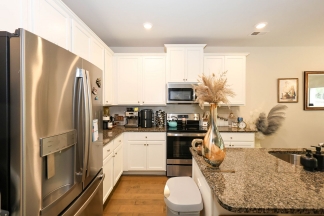 Unfurnished Townhome Wooded Backyard